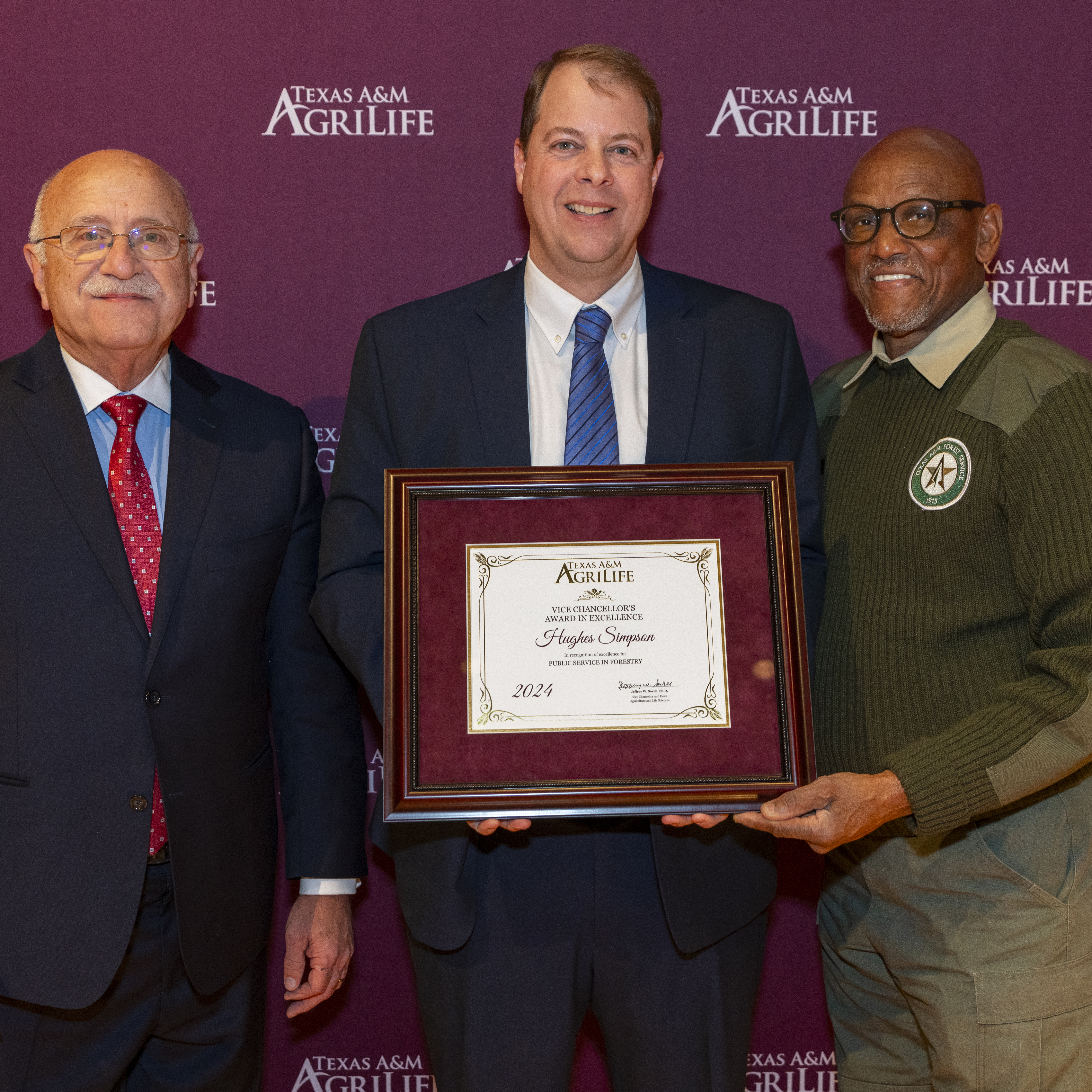 Hughes Simpson, Texas A&M Forest Service Assistant Director, External Affairs, was presented the Public Service in Forestry Award by Texas A&M University Vice Chancellor Dr. Jeffrey Savell, Wednesday, Jan. 8, 2025.